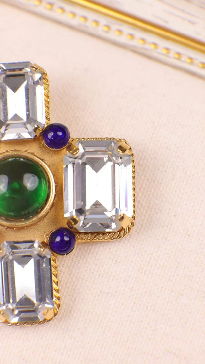 Chanel 1991 Brooch with Blue-Green Glass Rhinestone Inlay and Cross Design