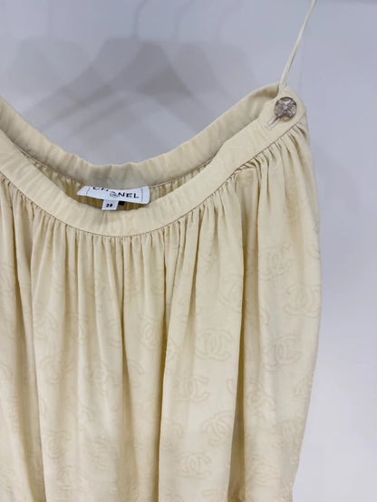 Chanel 23S CC logo light yellow ruffled midi skirt