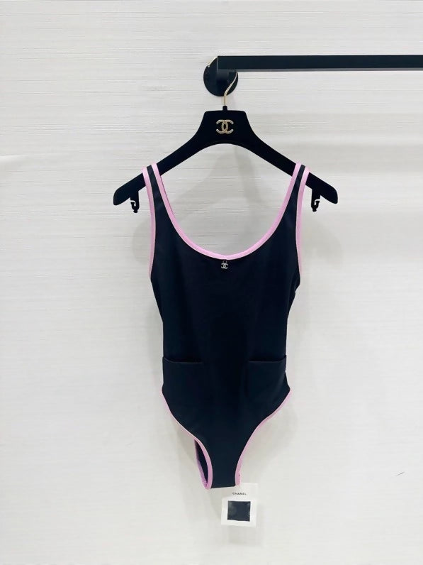 Chanel 25m Coco Beach collection pink-trimmed swimsuit