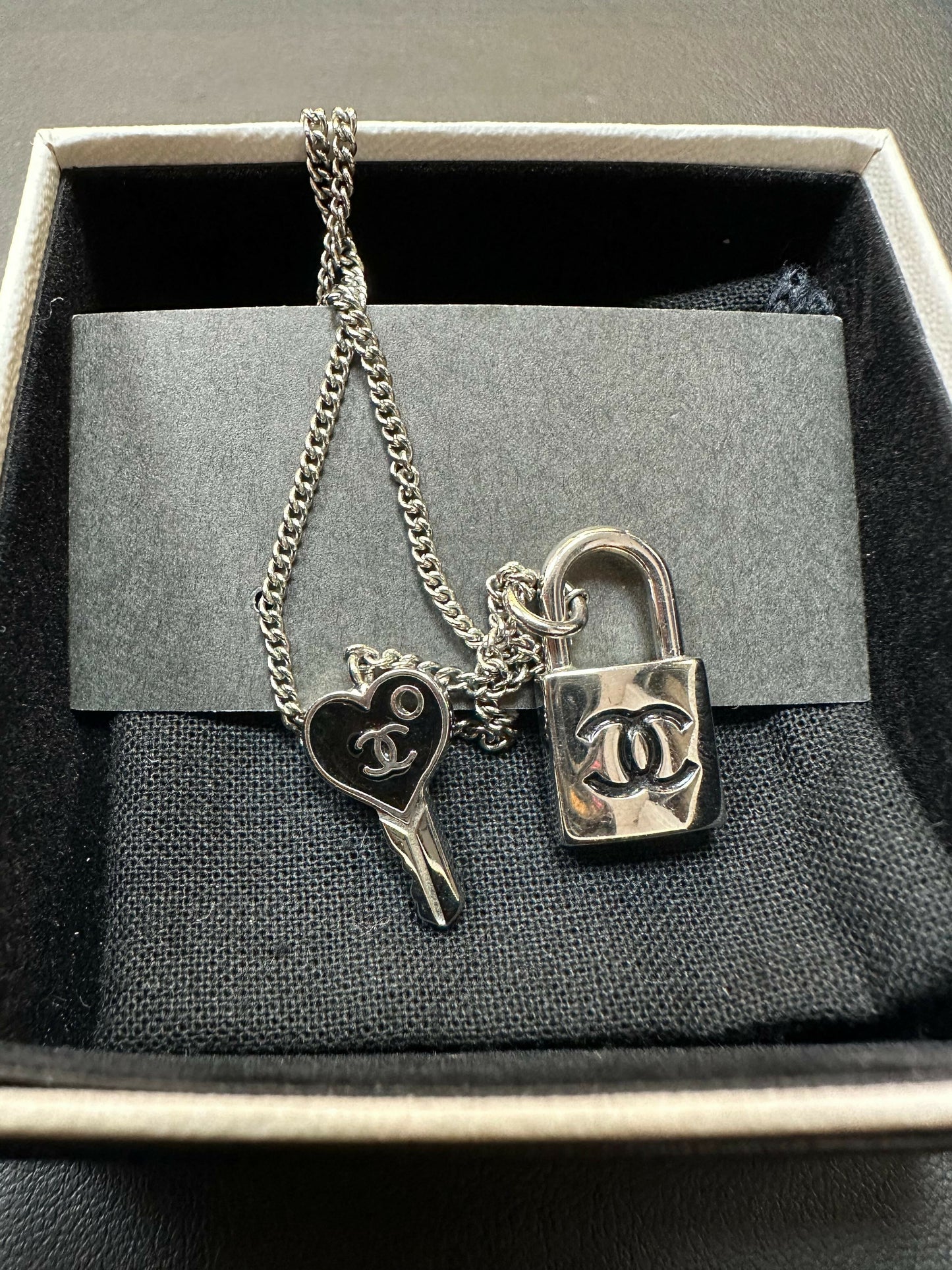 Chanel Vintage 07P Metal CC Logo Silver & Black -Tone Padlock and Key Necklace