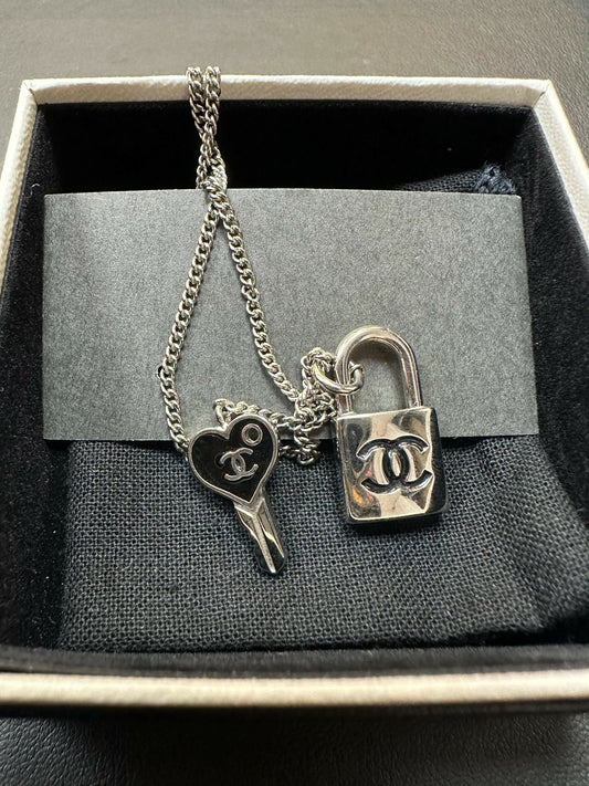 Chanel Vintage 07P Metal CC Logo Silver & Black -Tone Padlock and Key Necklace