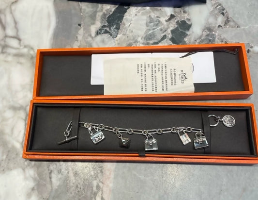 Hermes La Ronde des Sacs silver charm bracelet