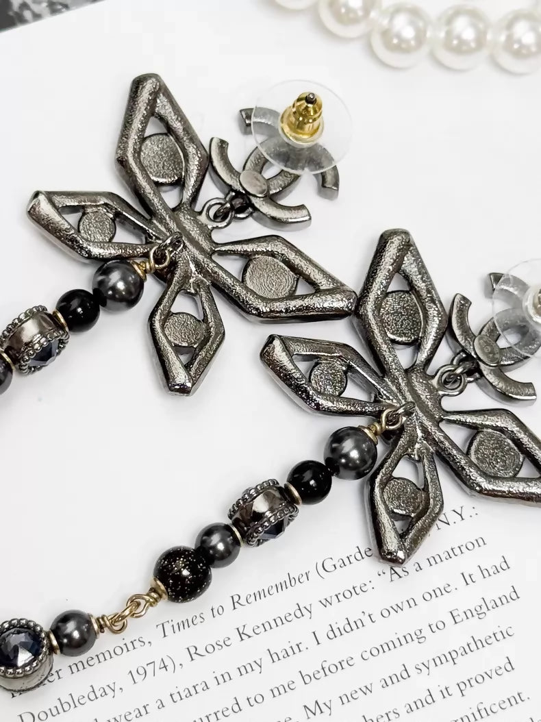 Chanel Métiers d'Art silver butterfly long stud earrings