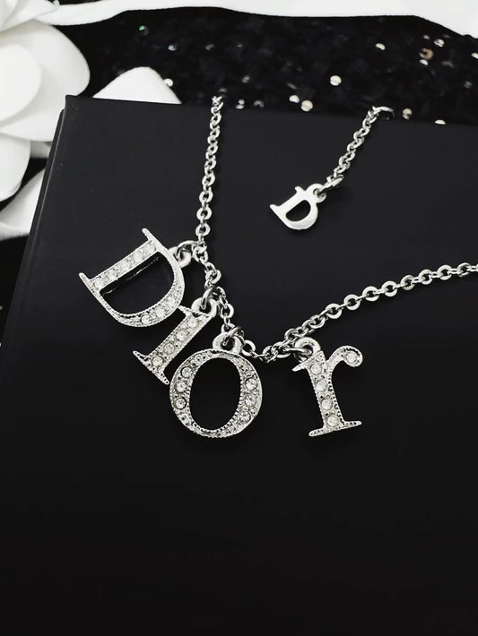 Dior bracelet with a letter pendant fully set with diamonds