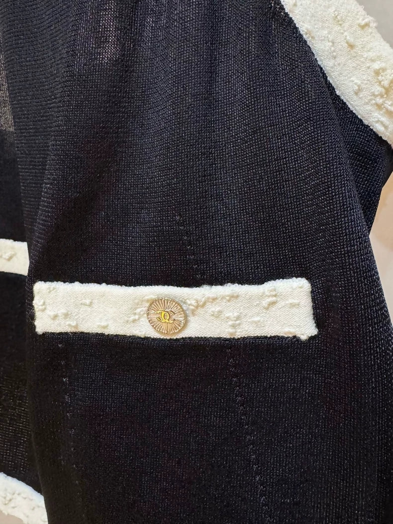 Chanel 25A black and white trim top