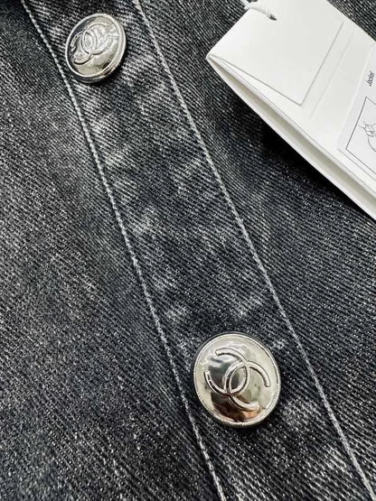 Chanel's popular black and grey denim jacket with logo detailing