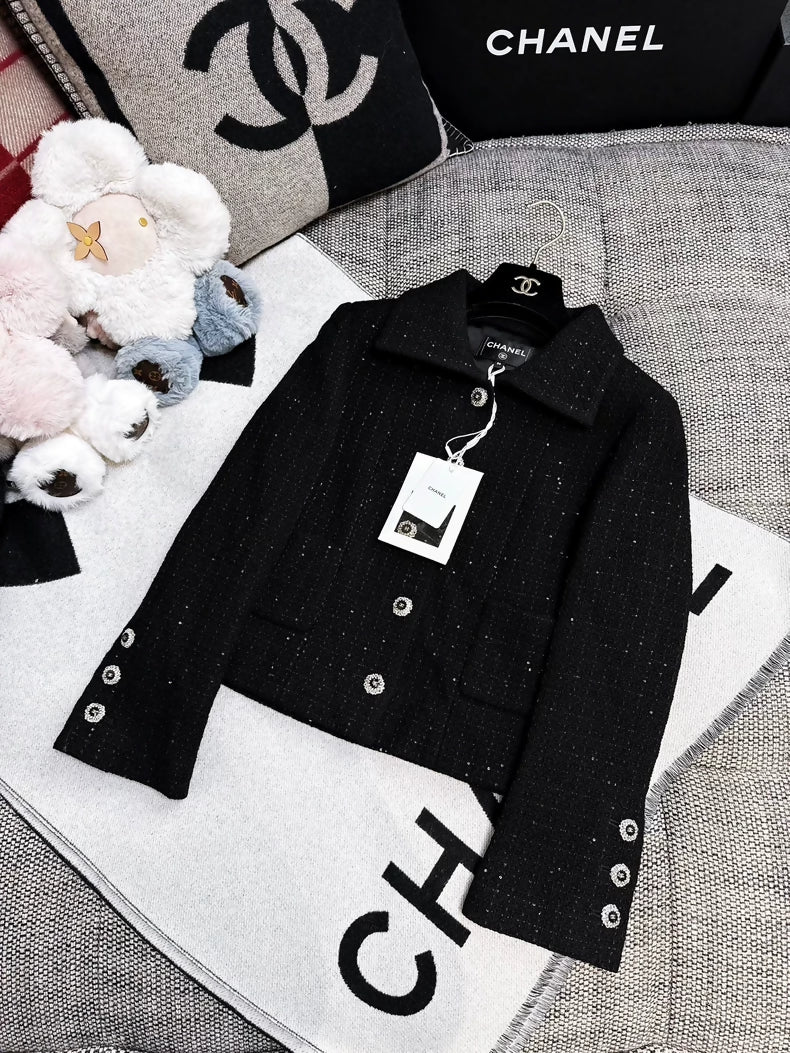 Chanel 25k black sequined tweed cropped jacket and skirt