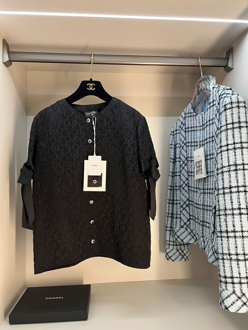 Chanel 25k black shirt with bow sleeves