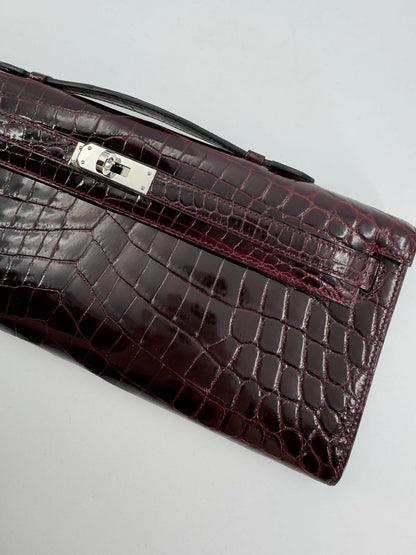 Hermès Kelly Cut Bag in Bordeaux Shiny Porosus Crocodile Leather with PHW