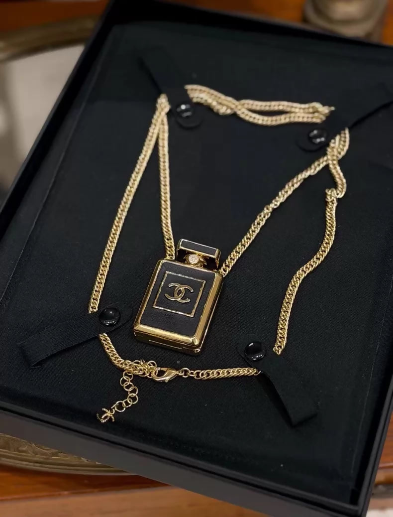 Chanel perfume bottle necklace