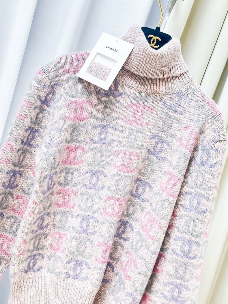 Chanel 22k pink turtleneck sweater