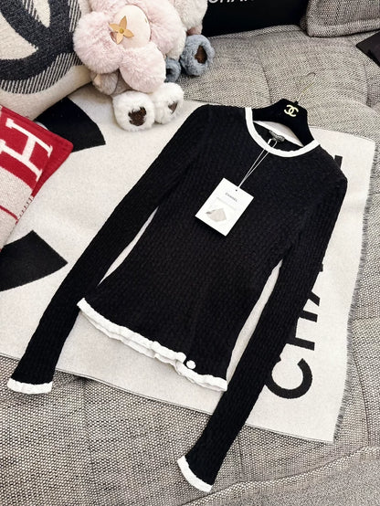 Chanel 22C black knit top