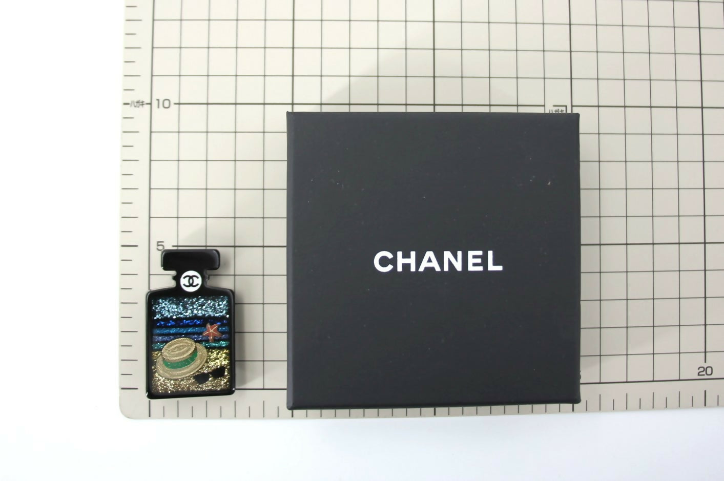 Chanel 18S Resin Beach Black Perfume Bottle Brooch