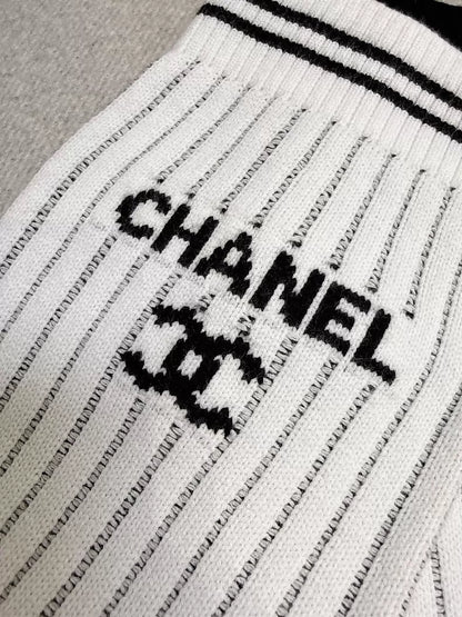 Chanel 24C white and black striped stockings