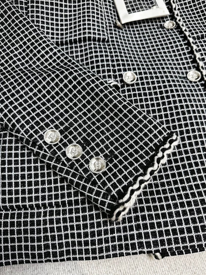 Chanel 25c black and white checkered jacket