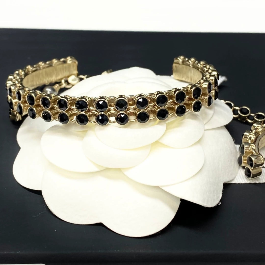 CHANEL 21k limited edition black & gold  ring and bracelet