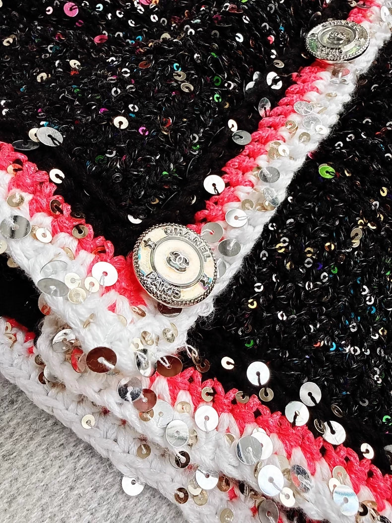 Chanel 24C black cardigan with pink trim and colorful sequins