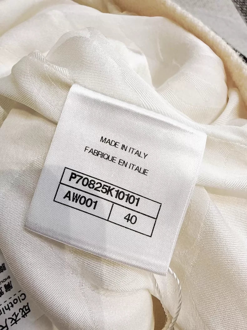 Chanel 21S  off-white knit cardigan with heavy embroidery, sequined camellia
