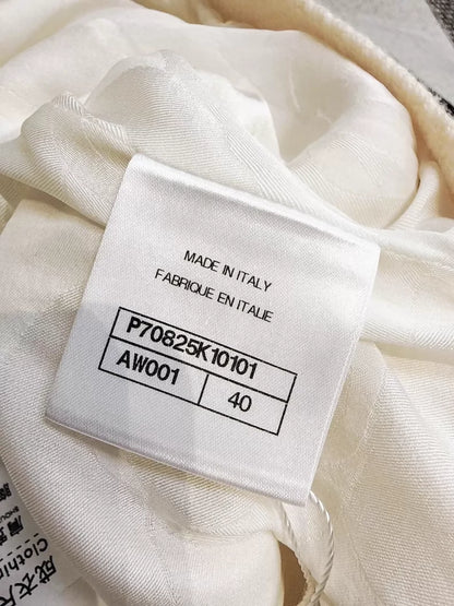 Chanel 21S  off-white knit cardigan with heavy embroidery, sequined camellia