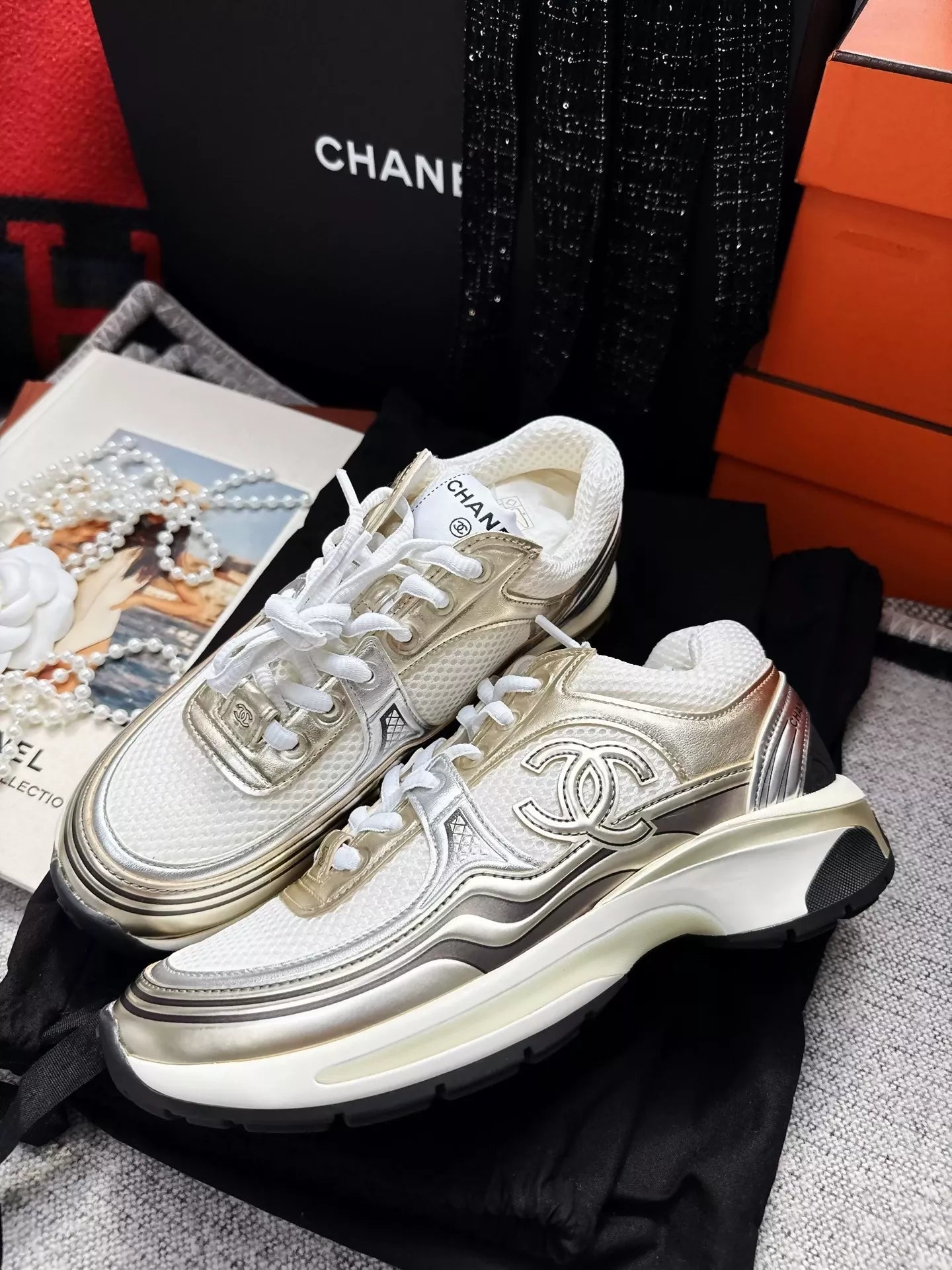 Chanel 23C popular gold sneakers