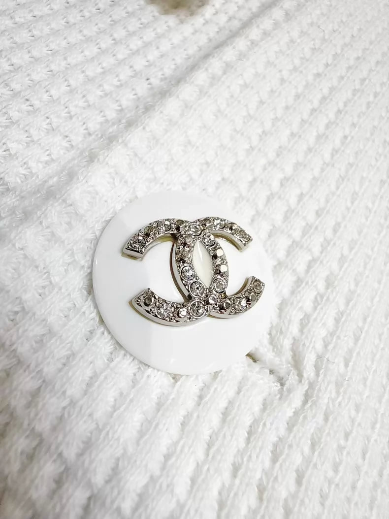 Chanel 21C white tweed jacket with rhinestone buttons
