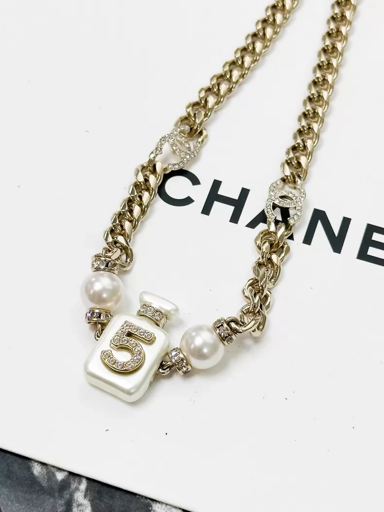 Chanel Spring/Summer 2022 Collection N 5 white perfume bottle long necklace