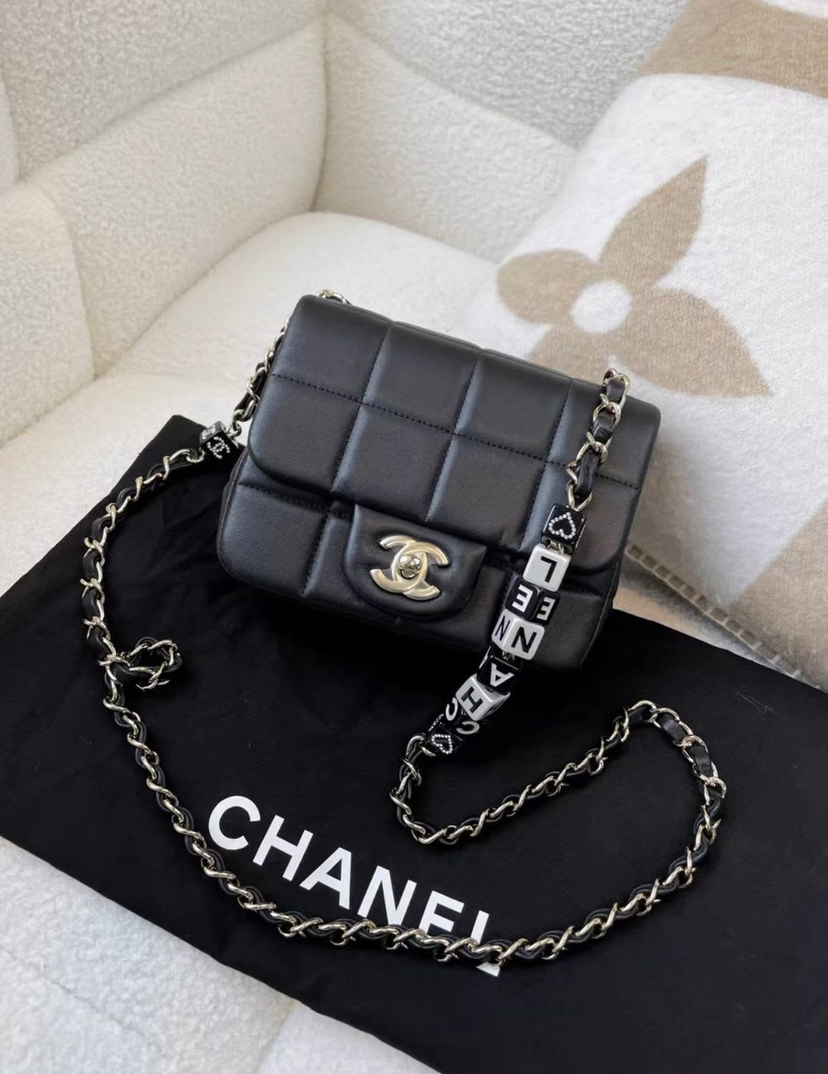 Chanel 23 early spring black letter dice chain bag