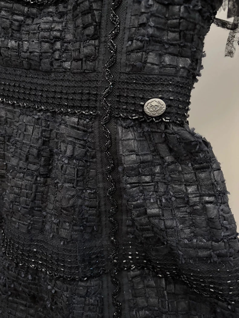 Chanel 2010 Black Dress plus camellia brooch
