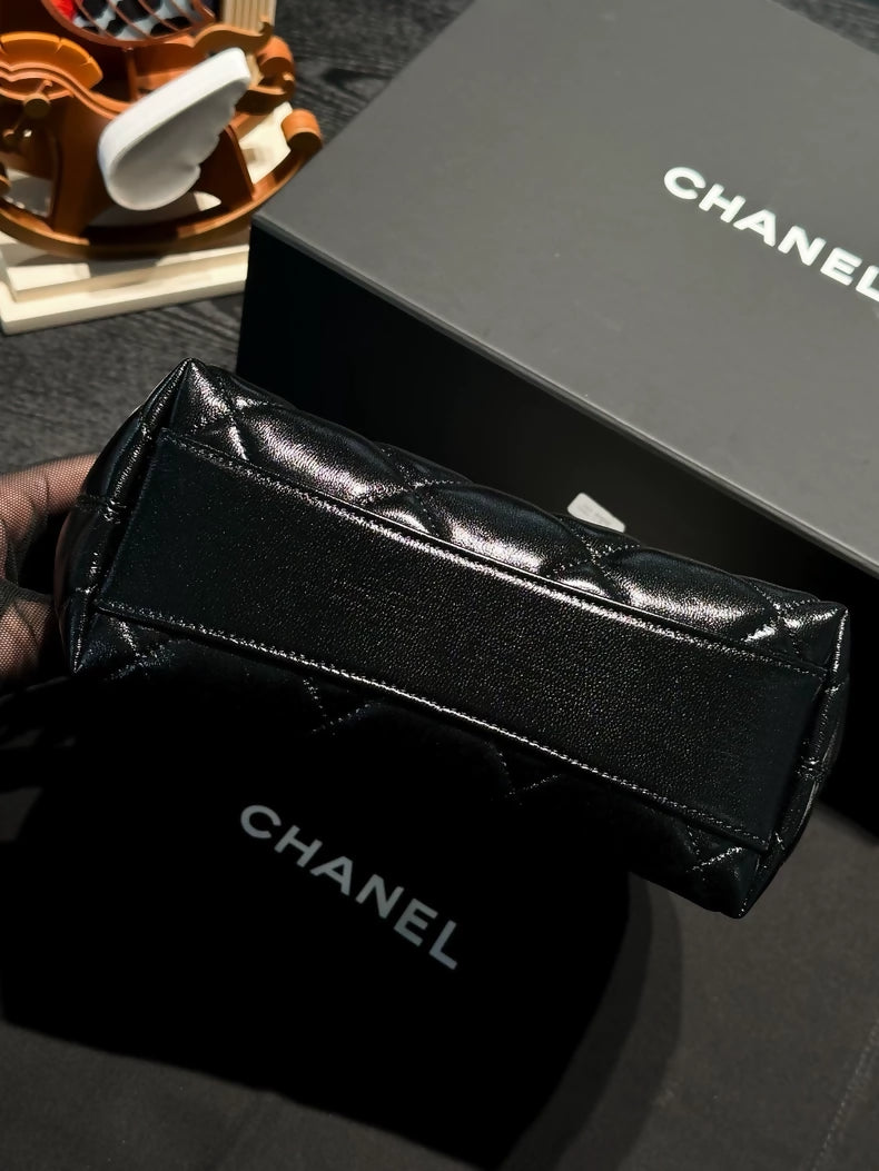 Chanel 24A black and gold waxed leather, small size cross body bag