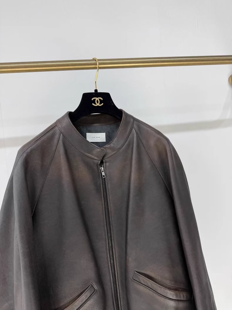 The Row's new distressed brown calfskin leather jacket,