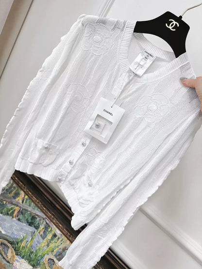 Chanel 23s white camellia knitted cardigan