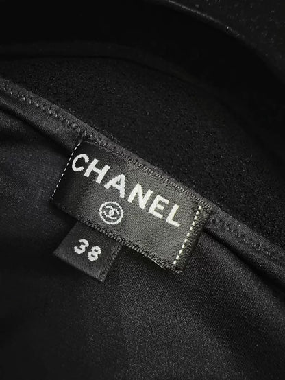 Chanel 23s black bow-tie top