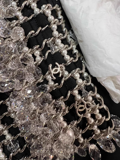 Chanel 19K Black and white tweed chain clutch bag