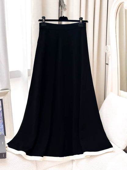 Chanel 25A black and off-white knit midi skirt