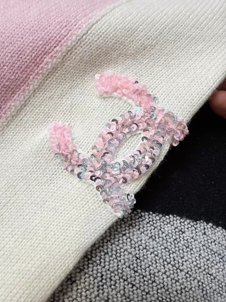 Chanel 24C pink and white cashmere knit dress with double C sequined logo badge