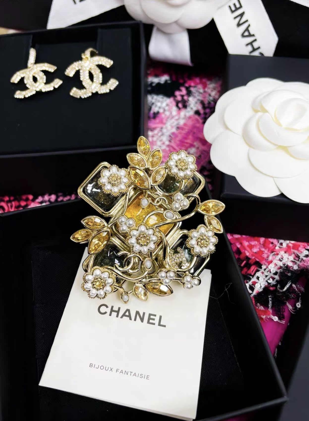 Chanel 22 flower cross brooch