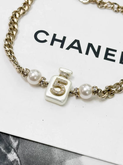 Chanel Spring/Summer 2022 Collection No. 5 white perfume bottle choker necklace
