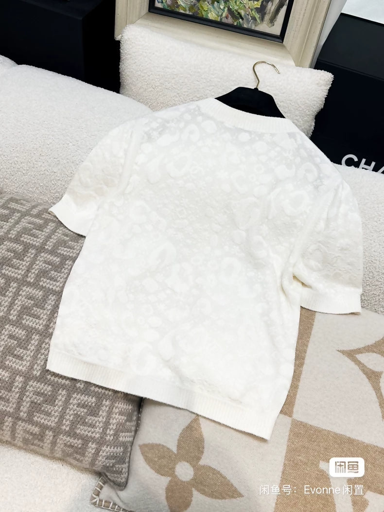 Chanel 23A white camellia cardigan