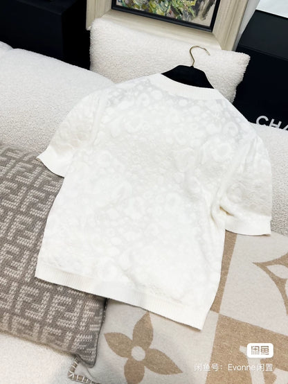 Chanel 23A white camellia cardigan