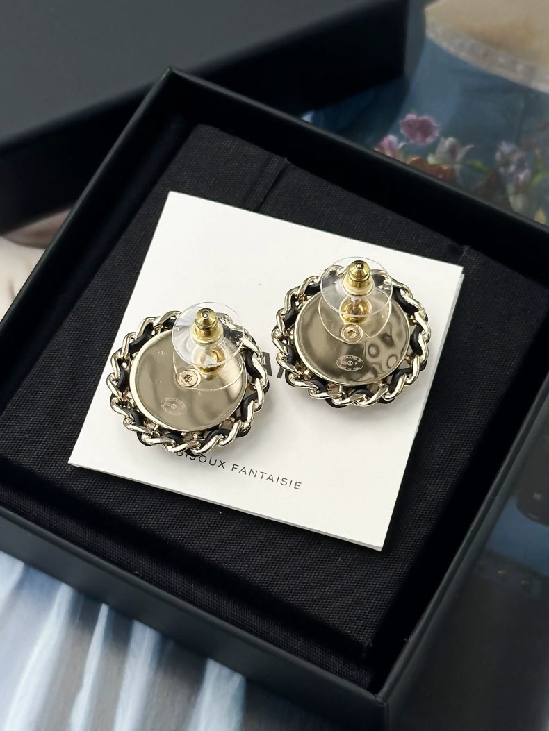 Chanel 25P earrings in blue denim