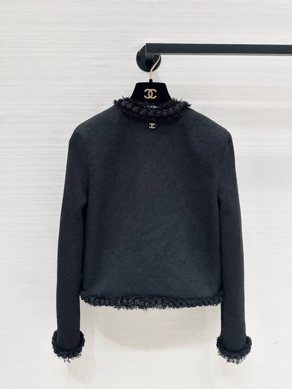 Chanel 26A black tweed jacket and skirt set