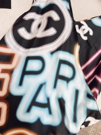Chanel 21S neon CC logo dress