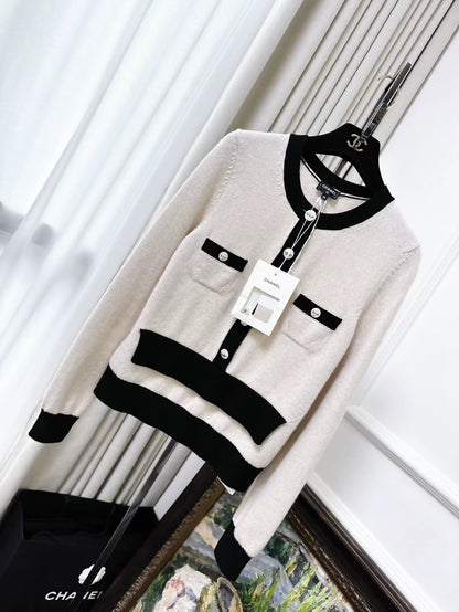 Chanel 25K beige and black color-blocked knit top