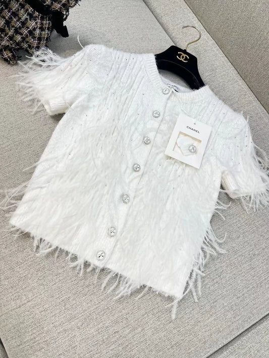 Chanel 25s white feather cardigan
