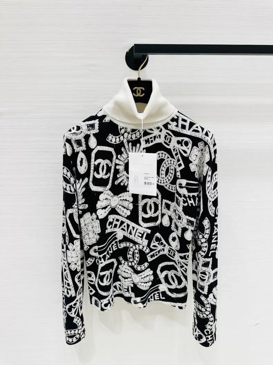 Chanel Ski Collection Black and White Print Jewelry Knit Top,