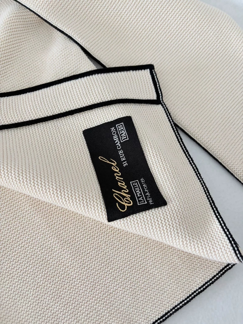 Chanel 26S off-white knit cardigan with black trim