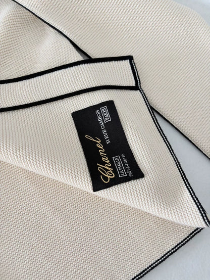Chanel 26S off-white knit cardigan with black trim
