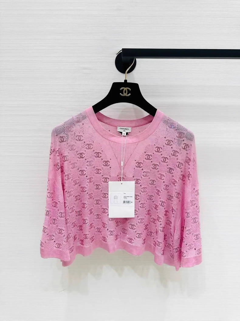 Chanel 23p pink top adorned with CC logo and rhinestones