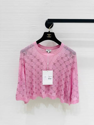 Chanel 23p pink top adorned with CC logo and rhinestones