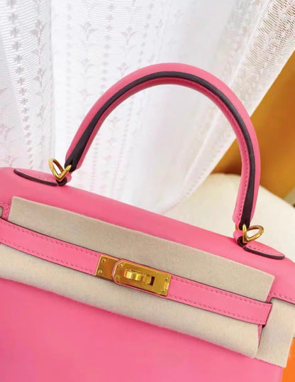 Hermes Kelly 25 pink Swift leather gold hardware